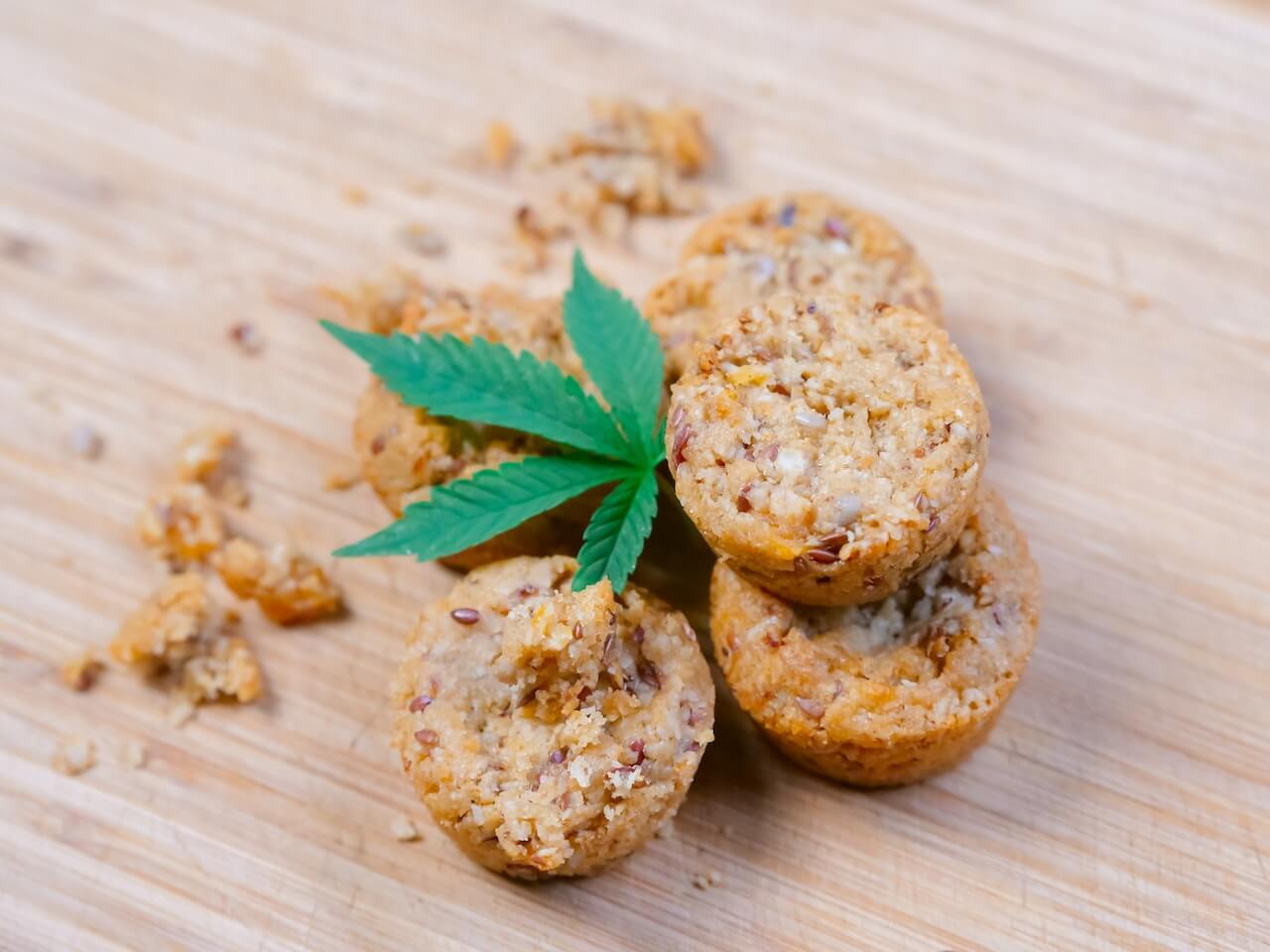 Baked muffins with cannabis leaf